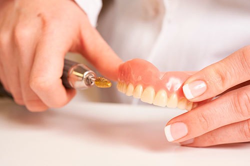 repairing dentures