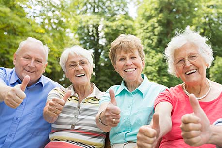 smiling senior woman on the phone